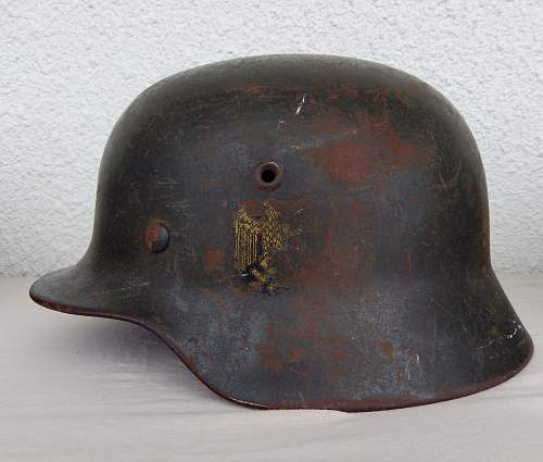 Three german helmets