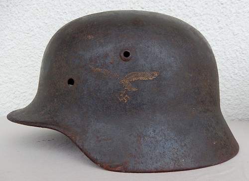 Three german helmets