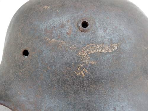 Three german helmets