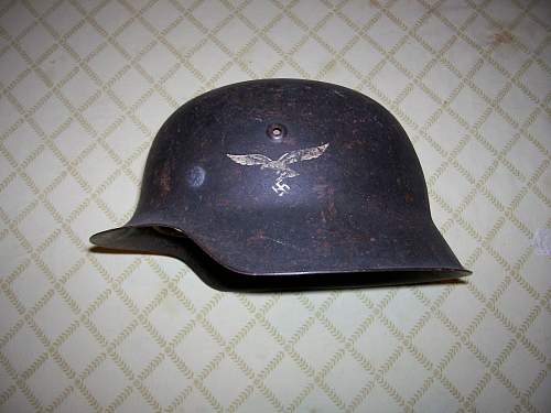 M42 Luftwaffe helmet. Anyone seen a helmet patina like this?