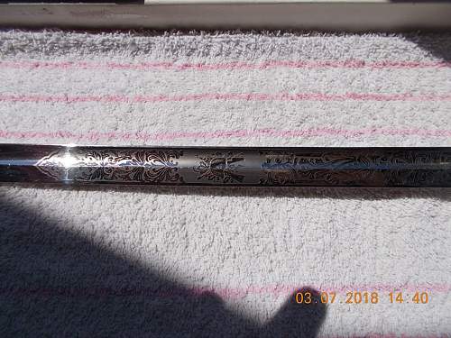 Strange etched Pack sword