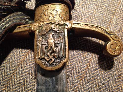 Third Reich sword with addition eagle.