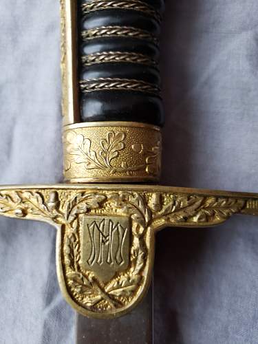 Is this ww2 German Lion Head Officers Parade Sword Real ?