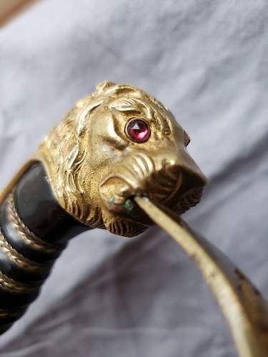 Is this ww2 German Lion Head Officers Parade Sword Real ?