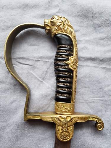 Is this ww2 German Lion Head Officers Parade Sword Real ?