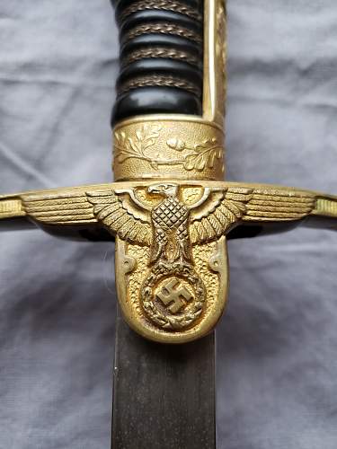 Is this ww2 German Lion Head Officers Parade Sword Real ?