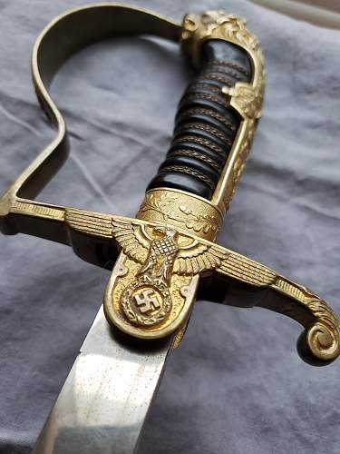 Is this ww2 German Lion Head Officers Parade Sword Real ?