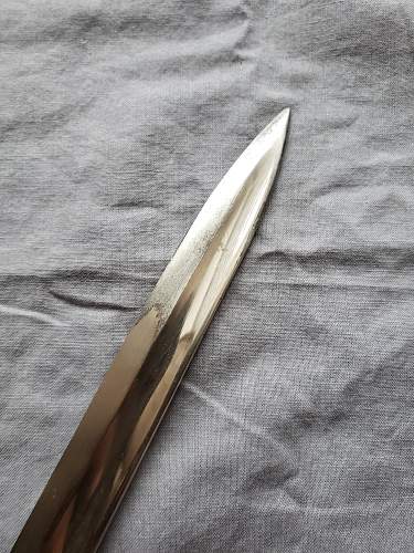 Is this ww2 German Lion Head Officers Parade Sword Real ?