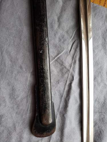 Is this ww2 German Lion Head Officers Parade Sword Real ?