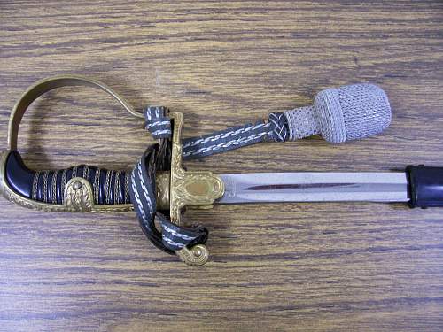 Is this ww2 German Lion Head Officers Parade Sword Real ?