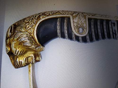 Is this ww2 German Lion Head Officers Parade Sword Real ?