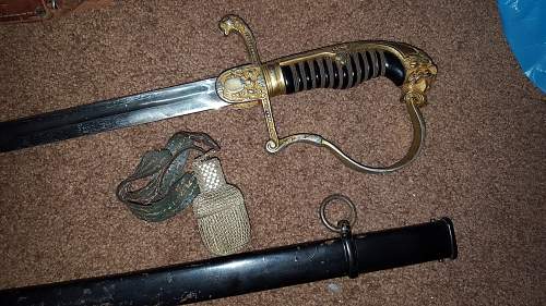 Please,  help Identify this old Lionshead sword. No markings &amp; No ruby eyes
