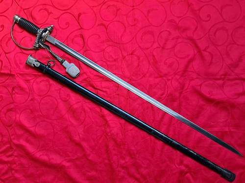 Police Sword NCO / Solingen Herm. Rath.  Is it worth the purchase as a new collector?