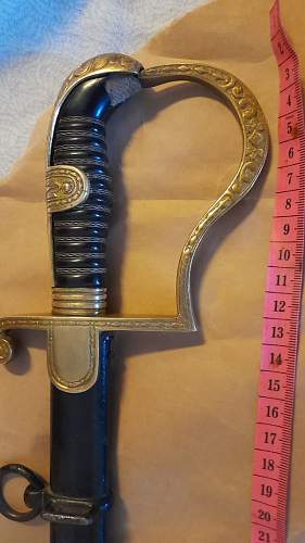Need help identyfiyng sword before sale