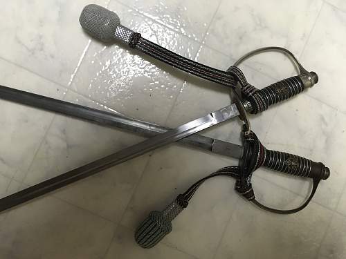 Left handed police swords?