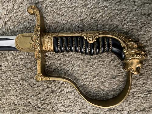 WKC Lion Head Sword Authentication