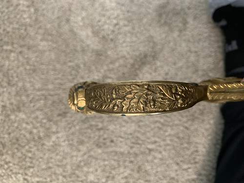 WKC Lion Head Sword Authentication