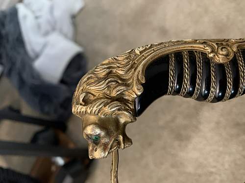 WKC Lion Head Sword Authentication