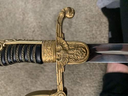 WKC Lion Head Sword Authentication