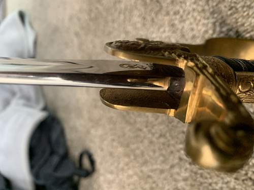 WKC Lion Head Sword Authentication