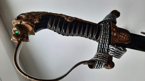 WKC Lion Head Sword Authentication