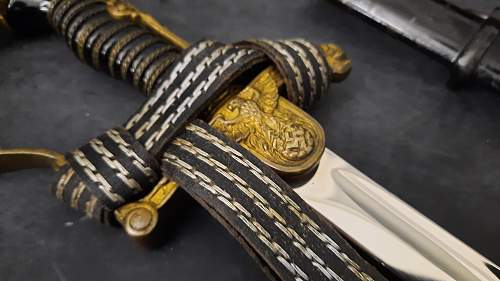 WKC Lion Head Sword Authentication