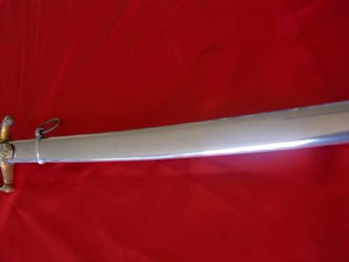 Lionhead Sword w/Nickel scabbard ?