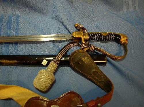 Is this  WW2 sword real or fake?