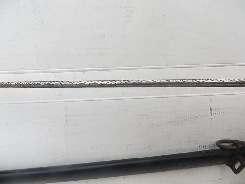 Engraved puma sword