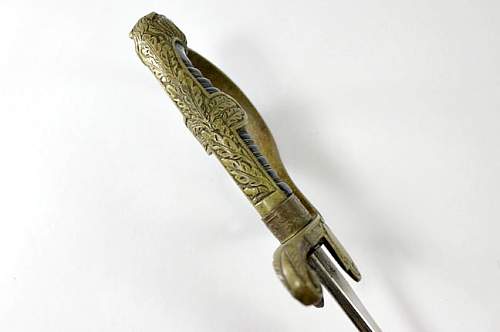 What is your opinion on this Unmarked Krebs Leopard Head Army Sword