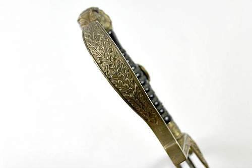 What is your opinion on this Unmarked Krebs Leopard Head Army Sword