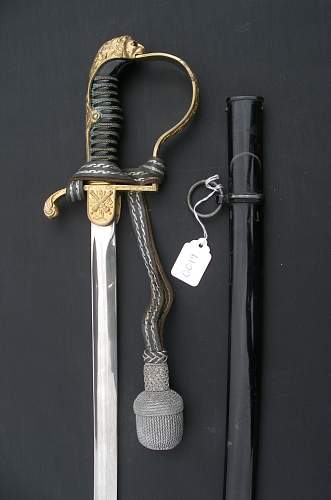 WKC half-lionhead sabre