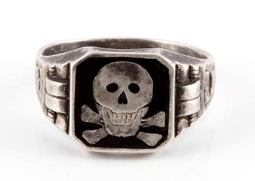 Totenkopf ring with leering skull in black enamel real or fake?