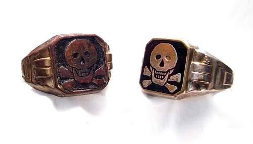 Totenkopf ring with leering skull in black enamel real or fake?