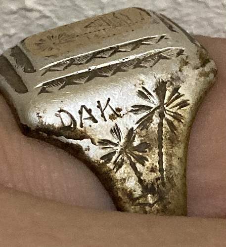 Your take is requested:  Is this DAK ring authentic?