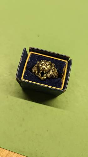 Hoping to get your thoughts on this yard sale 835Ln lion's head ring find