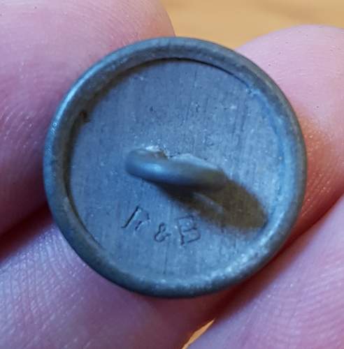 German WWII buttons.  Pips and unknown British button.