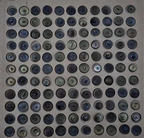 A variety of Belgian regimental buttons and their maker.