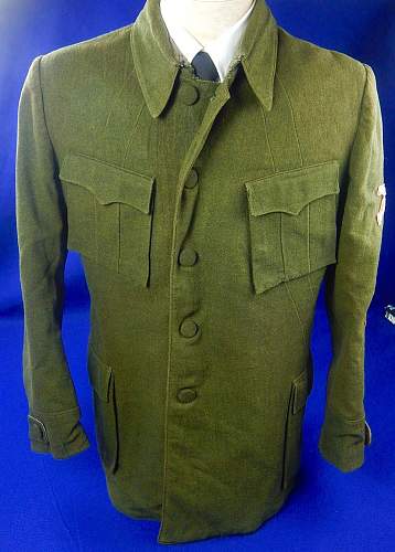 1920's tunic with officer and machine gun insignia