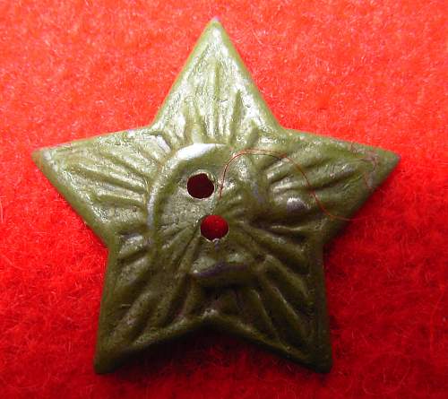 Green Russian cap badge