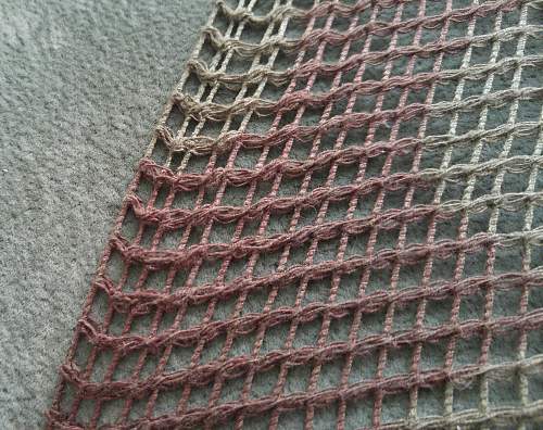 Camouflage net scarf.