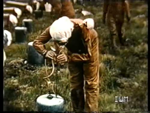 Unknown British overalls/hood from this 1942 Gruinard Island video - what are they?