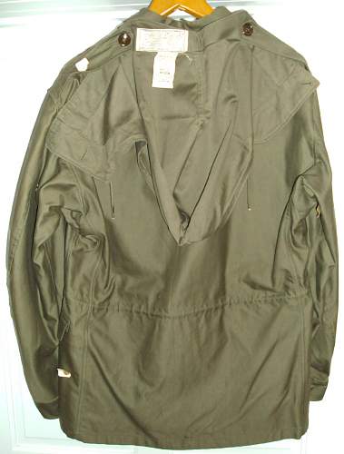 A Pair of Mint WWII 1943 Jackets both with cutter tags and QM tags. Never worn or issued.