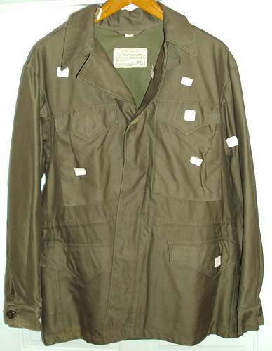 A Pair of Mint WWII 1943 Jackets both with cutter tags and QM tags. Never worn or issued.