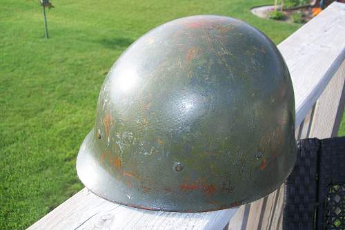 guys, Is this a late model Canadian M1 helmet , your opinions pleas