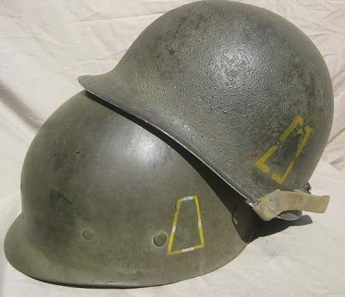 77th Division M1 Helmets.