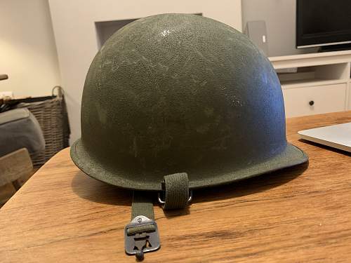 Would love to get your help in identyfying this M1 helmet a relative collected