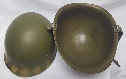 Camo M1 helmet from the vietnam period  - a mystery