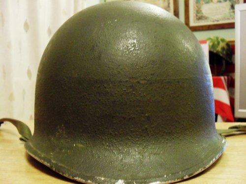 Fixed bail M-1 helmet, looks to have a gray painted band ?