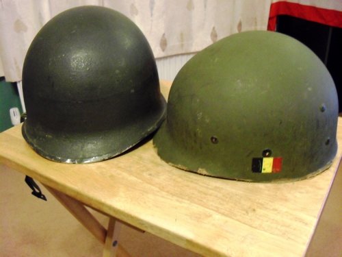 Fixed bail M-1 helmet, looks to have a gray painted band ?